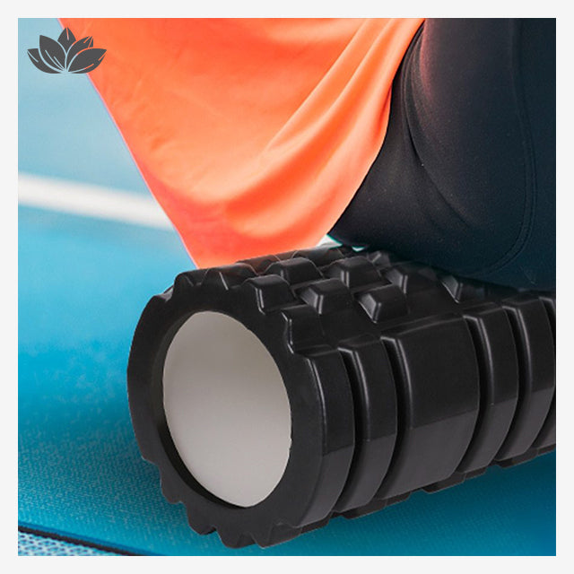 Utilisation du rouleau de massage Palm Canyon bleu au niveau des fessiers